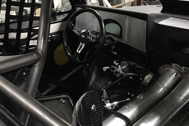 The tubing for the PT-3000 water-to-air intercooler comes through the truck's interior. If Jesse has his wish, the Weld Alumastars and Mickey Thompson ET Street Radial Pros will see pavement while competing in Hot Rod magazine's Drag Week, or the Rocky Mountain Race Week.