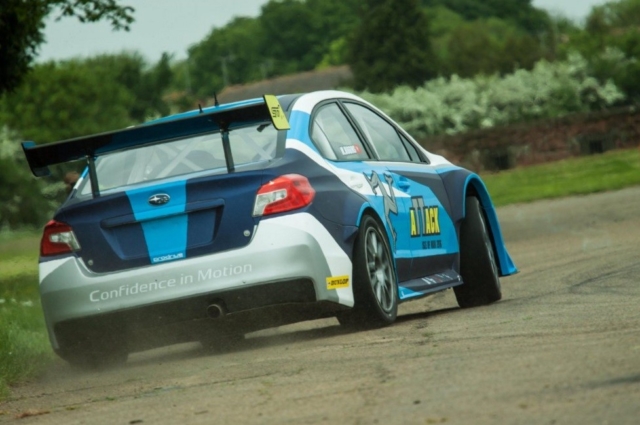 http://s1.cdn.autoevolution.com/images/news/gallery/mark-higgins-smashes-isle-of-man-tt-lap-record-with-a-subaru-wrx-sti_5.jpg