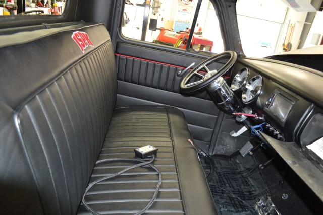 New black vinyl sets of the interior. The letters are of the owner's family first names.