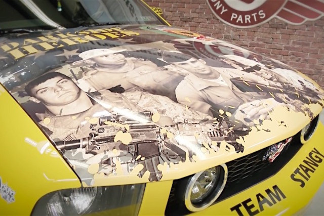 The hood of this 2006 Ford Mustang GT plays tribute to five amazing U.S. soldiers who tragically died in war.