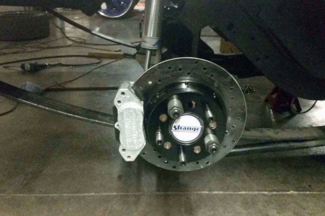 Aerospace Components brakes brings Jeff's Rally Nova to a halt after every pass after the 4.11 gears within the 12-bolt gets things going in a hurry. Menscer Motorsports double-adjuster shocks work with Calvert Racing split mono-leafs and CalTrac bars to get the most traction available, even with a limited 235/8.5-inch tire.