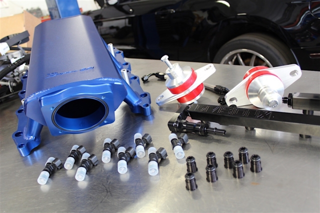 Coles said that this intake is compatible with low boost applications and higher boost applications, but that anything over 10-12 psi isn't recommended. Holley is currently in development of another intake for boosted applications that will accept those higher boost levels.