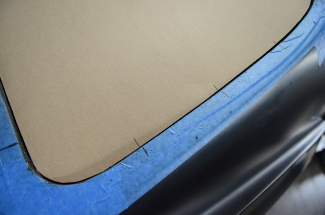 We pre-marked all of the mounting bolt locations around the perimeter of the rear window (and the windshield) on the painters tape.