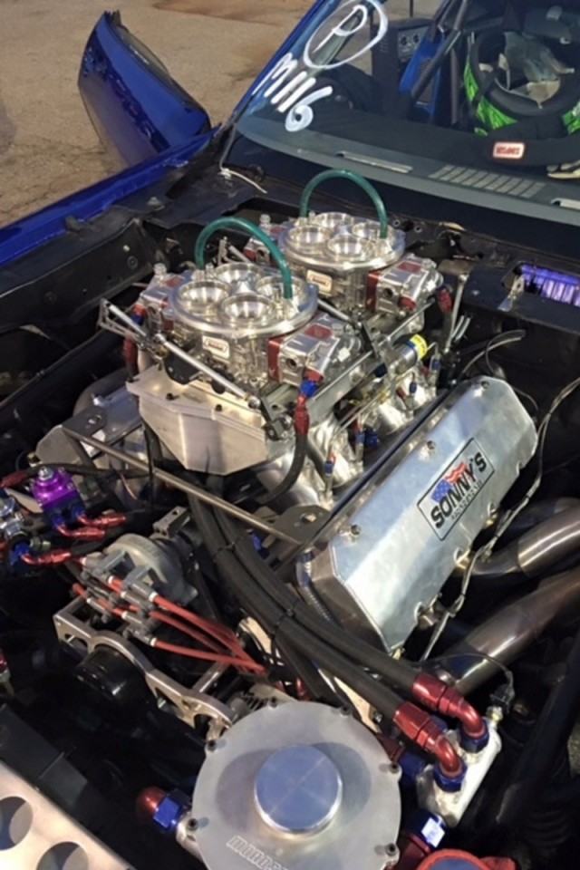 That's what we're talkin' about! That is 632-cubic inches of Sonny's Racing Engines goodness. Throw in 500 more horsepower from a NOS fogger kit, and this is one mean machine. The engine uses Brodix heads, a Sonny's sheetmetal intake, and a Jesel front-mount distributor. The engine also uses a Daily Dry sump oiling system, as well.