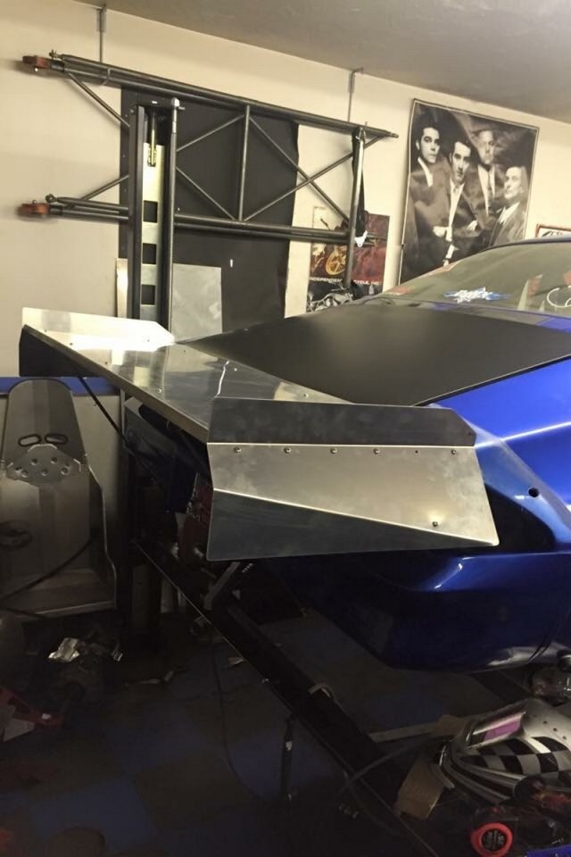 The Camaro's rear wing is an S&W item, but Mark modified the side plates to better fit what he wanted it to do.