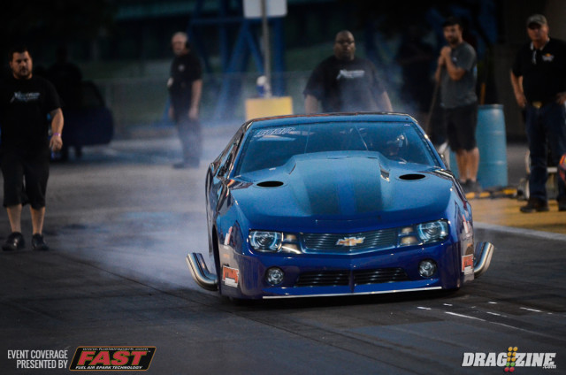 Los Angeles, California native Terry Barkley has transitioned from radial tire racing to Pro Mod, teaming with Carl Stevens, Jr. to wheel what is still the fastest door car to ever traverse the 1/8-mile. Barkley got out near the centerline in the opening session and had to lift.
