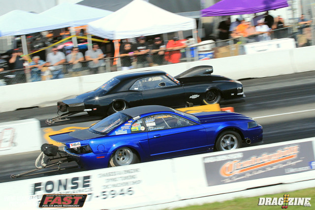 Tim Essex (near lane) faced off with Jerry Mitrovic who took the hole shot. As Essex' turbos brought in the boost the car got on the bars lifting the rear tires forcing him to leave and Mitrovic to earn a berth to round three with a 4.13 at 187.