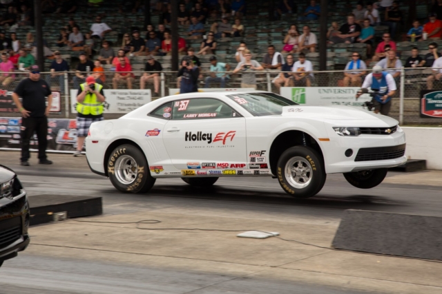Larry Morgan may have had a rough time in COPO qualifying, but he pulled off the biggest upset in round one taking down top qualifier Al Corda in a double breakout race running a 9.49 and cutting a .044 light.