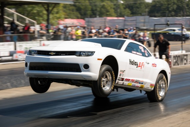 The Cinderella story that was Larry Morgan’s run at the COPO class came to an end when he lost to Phil Giles by .0084 in what has been the best race of day so far.