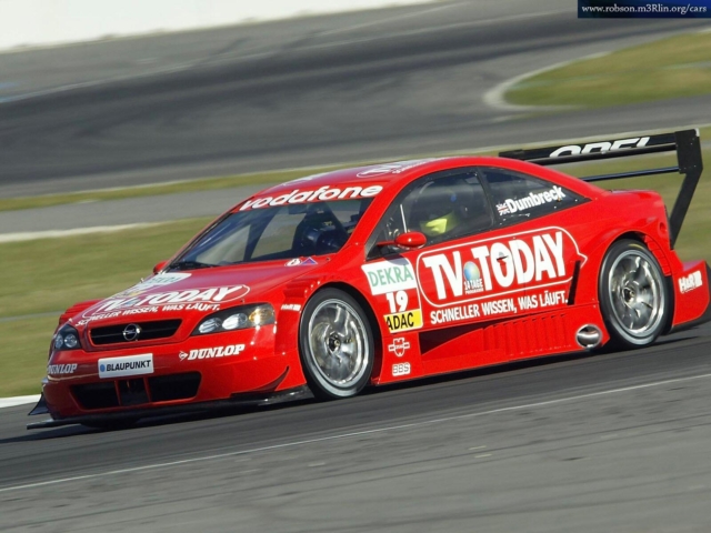 http://rennlist.com/forums/attachments/944-turbo-and-turbo-s-forum/689681d1356175069-side-exit-exhaust-opel-astra-dtm-1.jpg