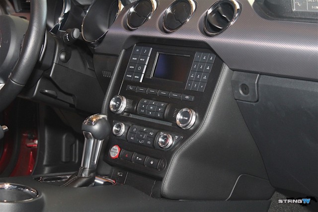 The factory head unit wasn't designed to be easy on the eyes, but it does get the job done if you're looking for simplicity in a small, featureless package.