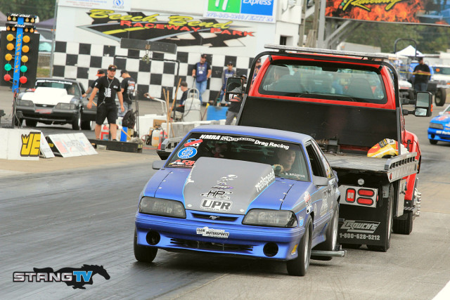 Michael Washington broke his Factory Stock car and it's doubtful he will return after getting towed off the track by the flatbed.