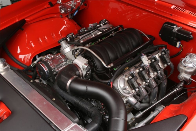 It might seem like a bit of a headache to try to fuse a modern, computer-controlled motor with a vintage chassis, but aftermarket engineering has made the process much easier over recent years. This modern LS looks right at home in this engine bay, despite more the mutli-decade discrepancy in their ages.