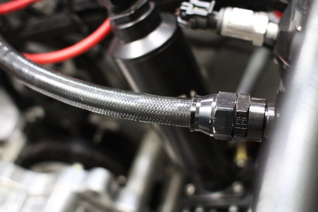 With alcohol, teflon lined fuel lines are recommended. We selected Fragola’s PFTE hose for long life and it’s exterior coating for additional durability.
