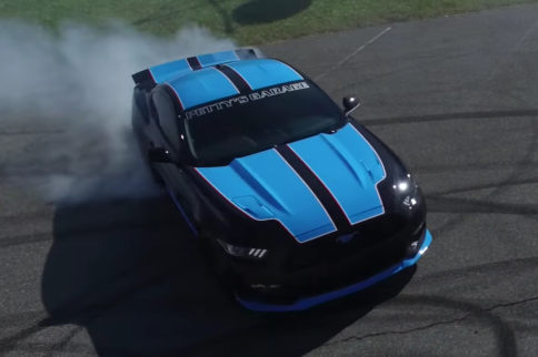Richard Petty autographs the asphalt with his 727HP ’Stang