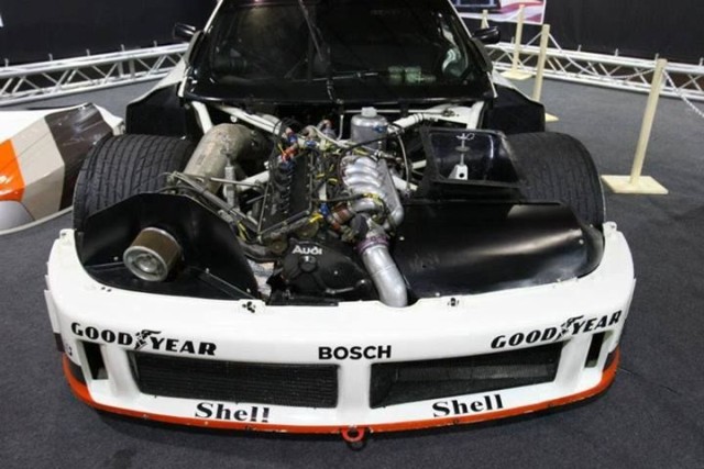 It's not certain which is more impressive - the engine position or the tire width.