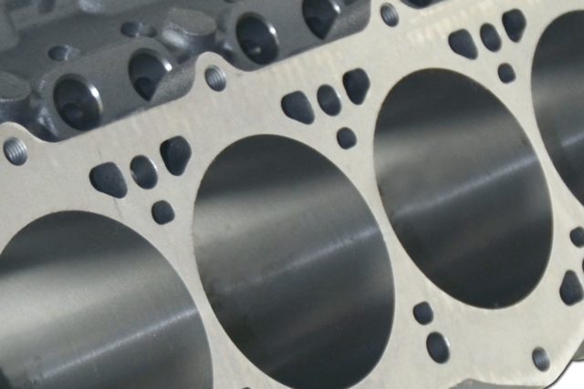 The 7/16-inch head bolt holes are set well below the deck surface and blind tapped to reduce the chance for water leaks. Moreover, there are two additional bolt holes to take advantage of the additional sealing available from heads feature six bolts per cylinder.