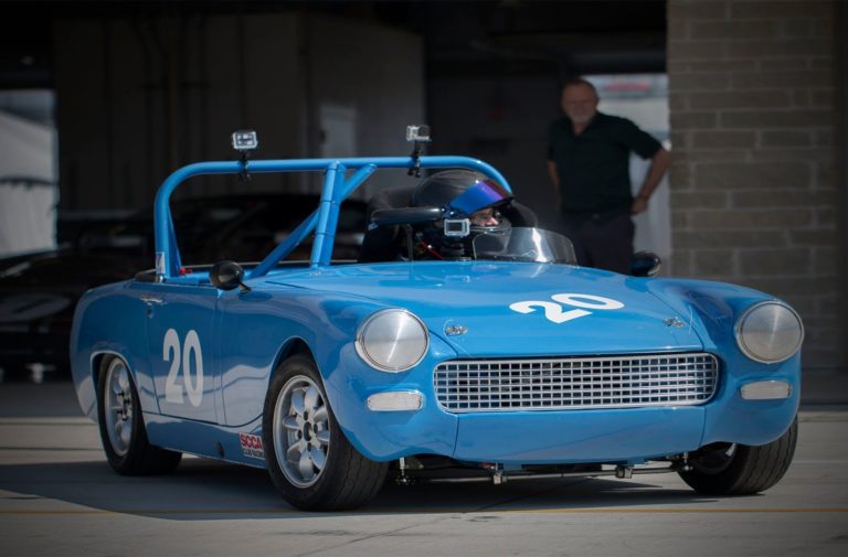 Video: '69 Austin Healey Chases Porsche Turbo At COTA!
