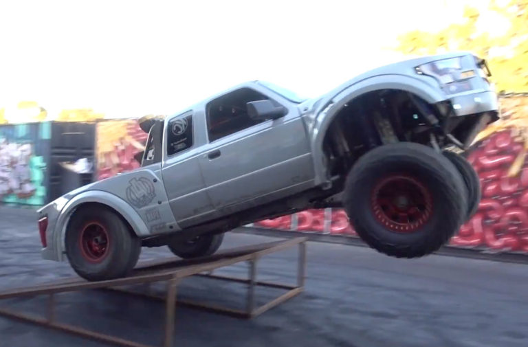 Video: Class 1400 Truck Jumps Rat-Rod On Donut Garage