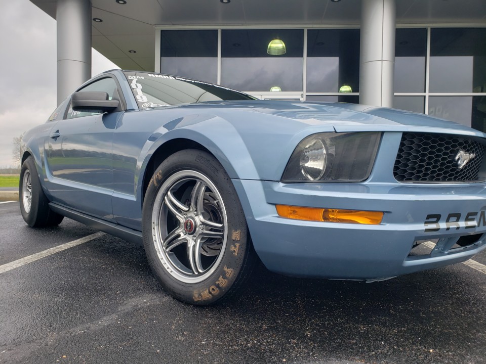 image of blue mustang with drag racing tires and wheels