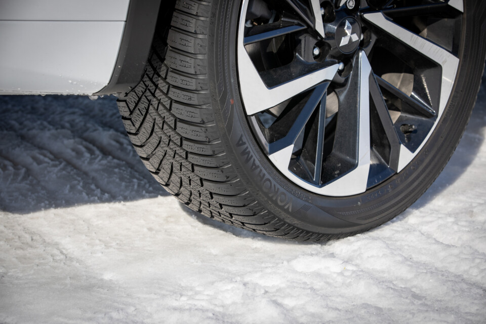 The Yokohama BluEarth snow tires showcasing strategically placed 3D sipes to enhance snow and ice traction.