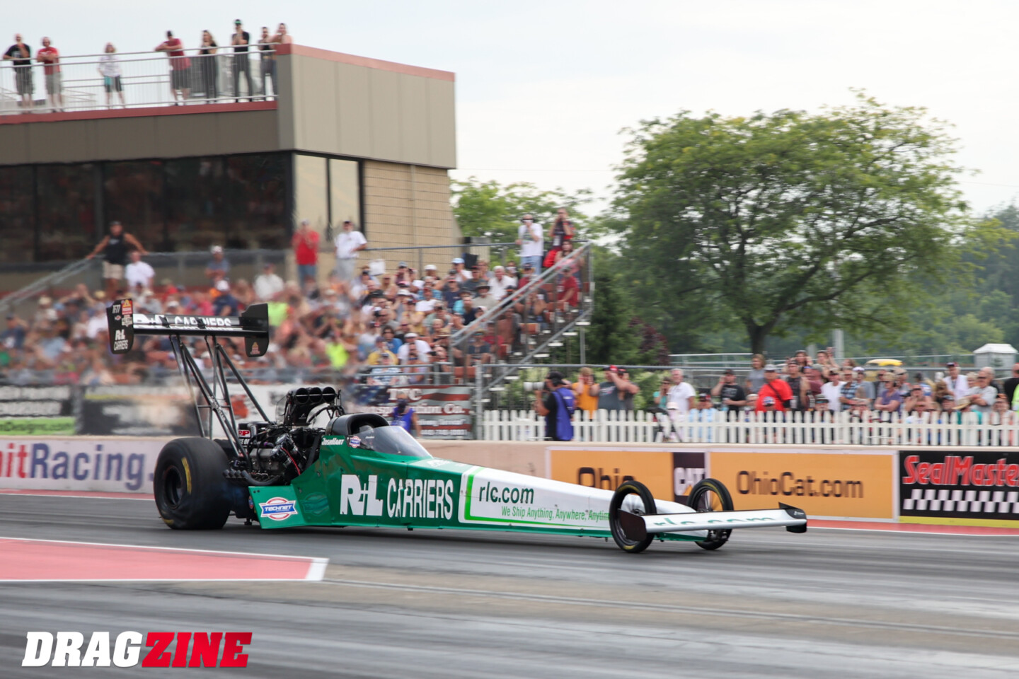 green drag racing car for NHRA payouts