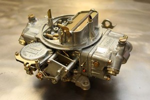A manual--or mechanical--choke requires extra linkages which is often more trouble than it's worth. A properly operating electric choke will definitely make your life easier.