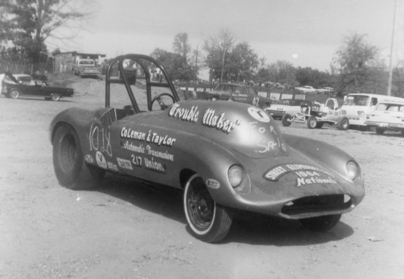 Joe Lunati’s “Trouble Maker” in its 1960’s battle trim. The car ran in NHRA’s A-Modified Sports class, holding AM/SP class records nine different times. The handicap ET of 10.18 seconds is show-polished on the Devin body’s flank, but the car was easily capable of running mid 9 second, no break-out times.