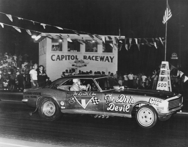 When Funny Cars advanced to flip-top ‘glass bodies and blown motors, Joe Lunati built this ’67 Camaro, again in his home garage. The nitro-fueled, 427 big-block Chevy would be Joe’s last race car before opening Lunati Cams, and it ran 7 second ET’s at 200+ mph. Joe drove this car to Funny Car Eliminator runner-up at the 1967 NHRA Nationals, and then crashed it a few short weeks later at Baton Rouge, Louisiana. After that Lunati retired from driving to concentrate on his growing business.