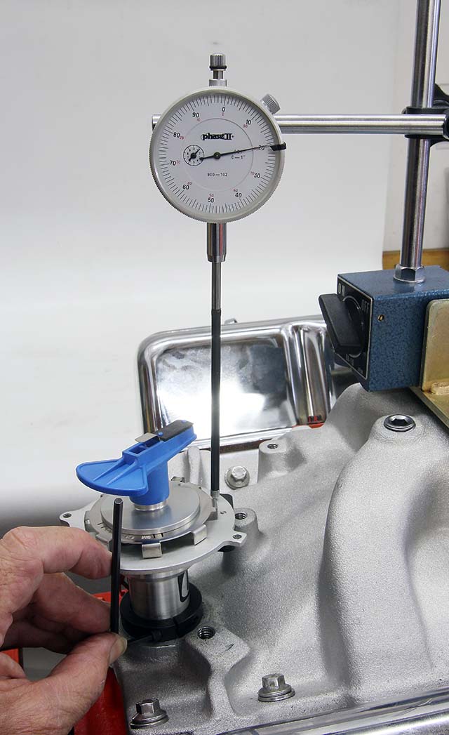 Next, raise the distributor between 0.010 and 0.030-inch. We used a dial indicator with a magnetic base to measure 0.020-inch. Now lock the collar in place with the set screws.