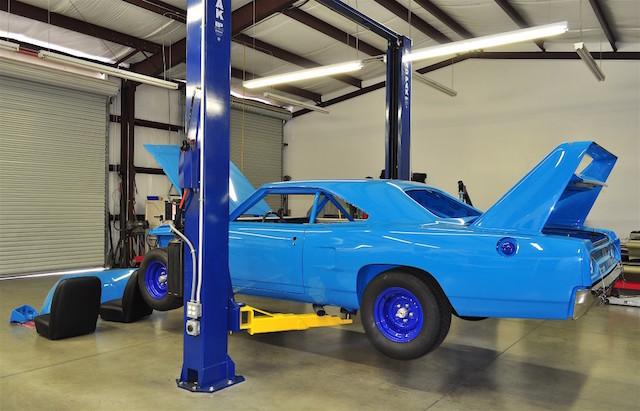 As the car was being constructed at Mitch’s Hotrod and Fabrication shop in Quarts Hill, California (near the Los Angeles area), it almost appears as a full-sized 1:1 model kit car being assembled!