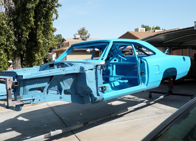 At this stage of the build, the body had already received a six-point roll cage, the torsion bars were removed, rear wheel openings enlarged, and modifications made to the rear floorpan for the 22-gallon fuel tank / ballast box.